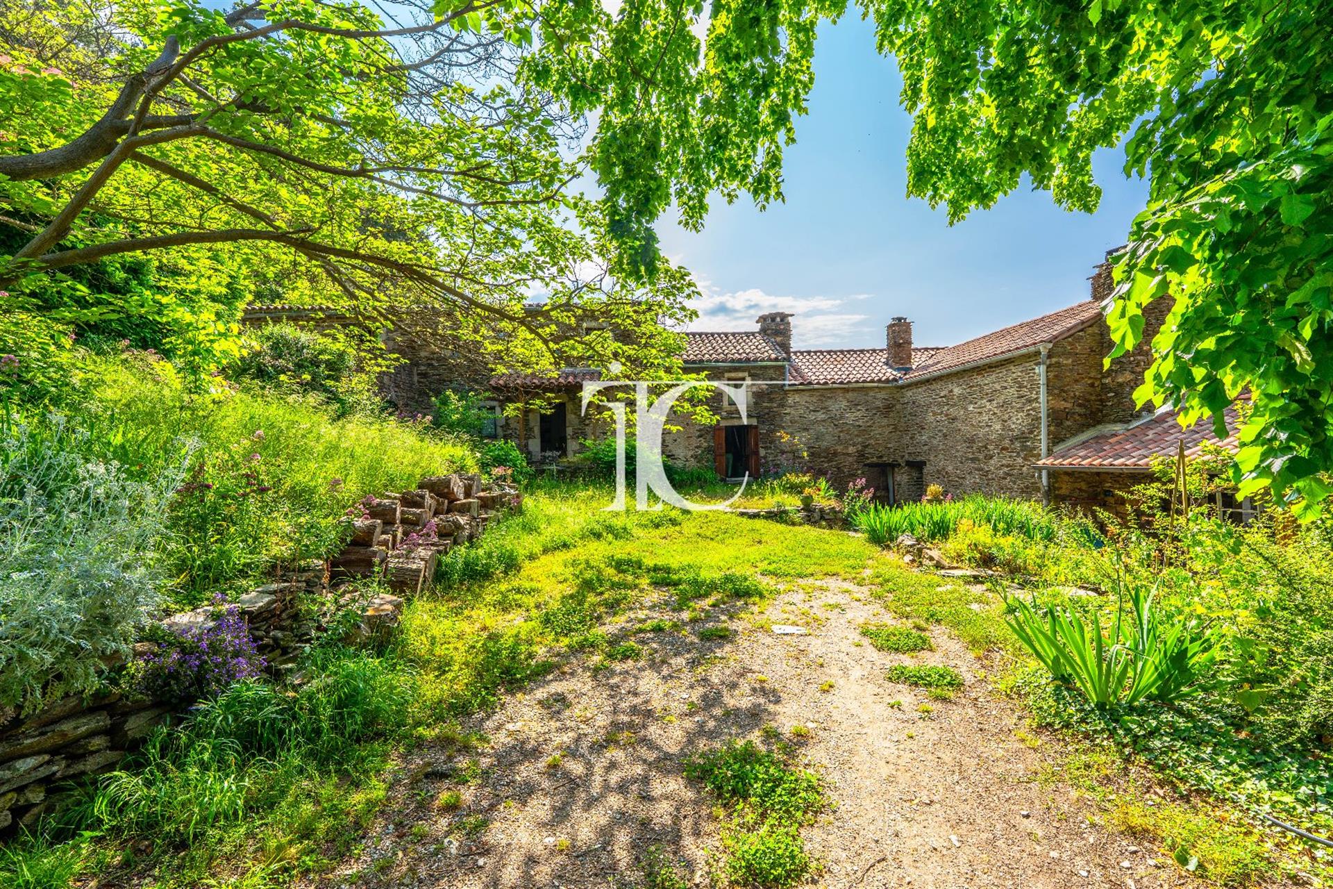 Cevennes farmhouse with land and swimming pool 
