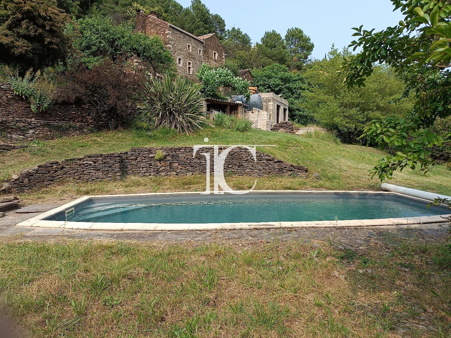Cevennes farmhouse with land and swimming pool 