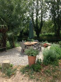 Rare opportunity. House for sale on the banks of the Canal du Midi: live the dream...