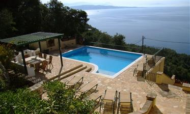 Fabulous 4 Bedroom Villa perched on the hillside near Nissaki, Corfu Greece with lovely sea views.