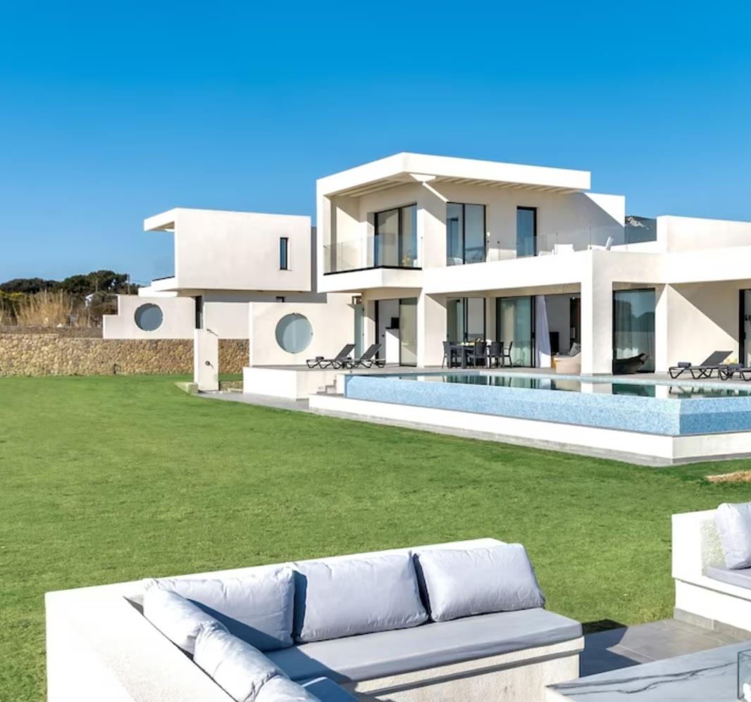 Perfectly located on the cliffs of Corfu's breathtaking coastline, this stunning new 4 Bedroom Villa