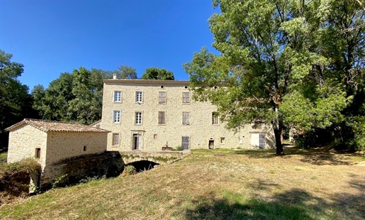 Authentique mill dating from 14th century, partly restored, with original features, on 10 acres of l