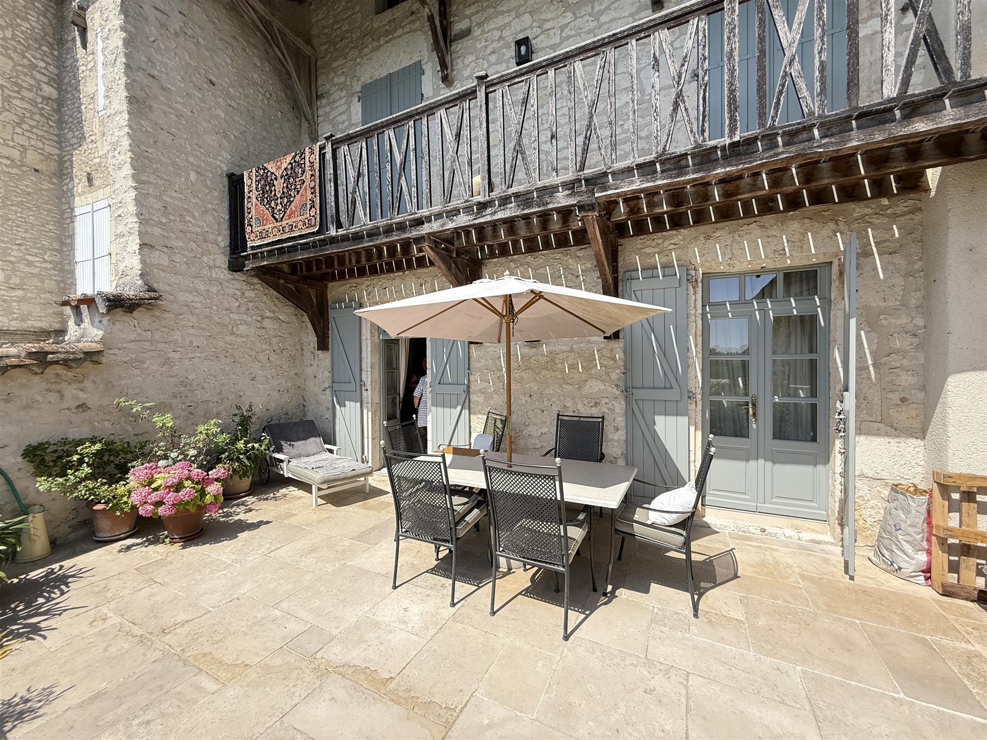 Residence of character dating from the fourteenth century located in the heart of a charming village