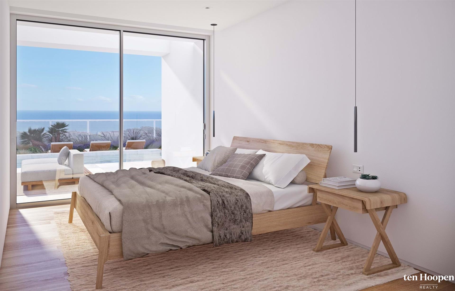 Luxury 3 bedroom townhouse with sea views within walking distance of the center of Praia da Luz