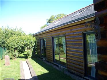 Log cabin in Brittany with pool & workshop