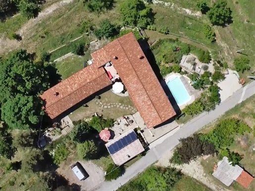 An Agrotourism with Five Apartments and Land in the Langhe Wine Country