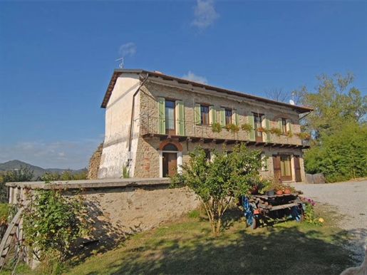 In the High Langhe, a Restored Country House with 2 Hectares of Land and a Glamping Area