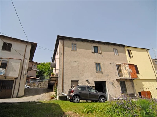 House with a Shop and Small Garden in the Center of a Langhe Village