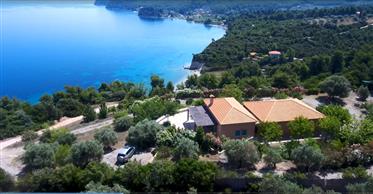Huis In Griekenland, eiland van Evia, zee kust vrijstaande Villa 190 m2 met adembenemend uitzicht o