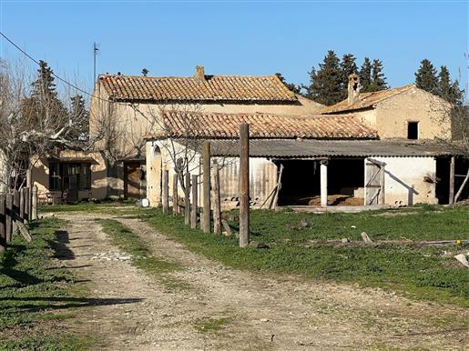 Old farmhouse to restore for sale in the Luberon park with 8955 sqm land and several agricol outbuil