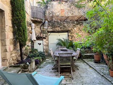 Village house for sale in Menerbes with 2 interior courtyard  and a terrace  wit a panoramic view