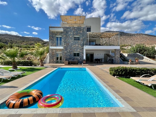 Modern Seaview 4-bedroom villa with beautiful garden and pool.