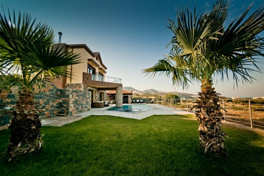 Luxurious villa with swimming pool and great sea views on outskirts of cosmopolitan town.
