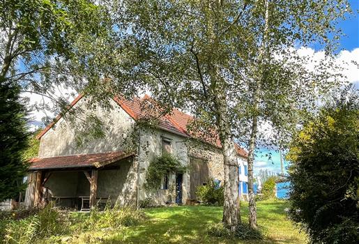For sale, renovated farmhouse including two houses that can be lived in separately or rented, Auverg