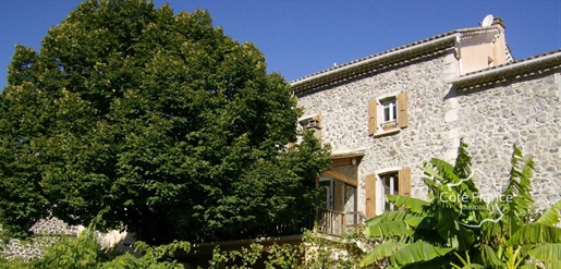 Stone house of 308 m2 with main house and two gîtes on wooded park of 7500 m2