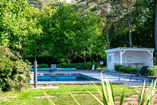 Villa de plain-pied avec plus d'un hectare de terrain et piscine
