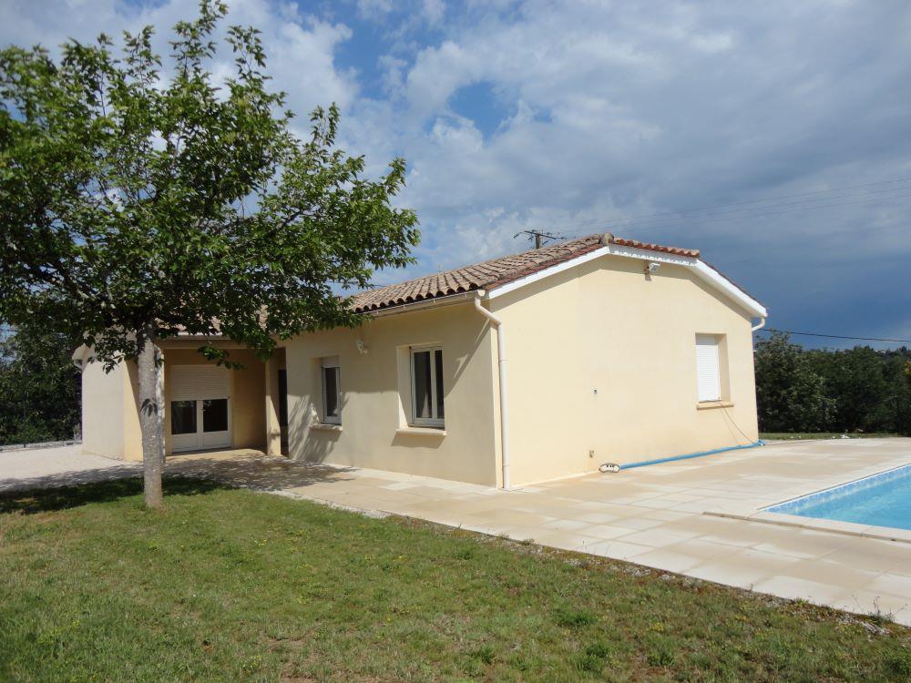 Contemporary house with swimming pool and fenced garden