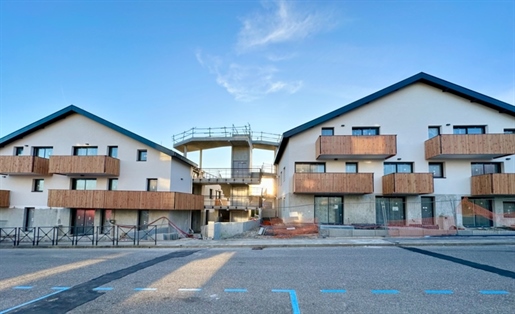 Dpt Ain (01), à vendre Ornex appartement T4 de 100,8 m² avec terrasse, parkings et cave