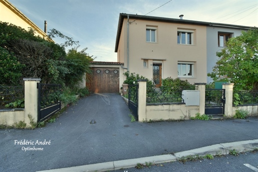 Townhouse with garden and garage, semi-detached on one side, close to all amenities