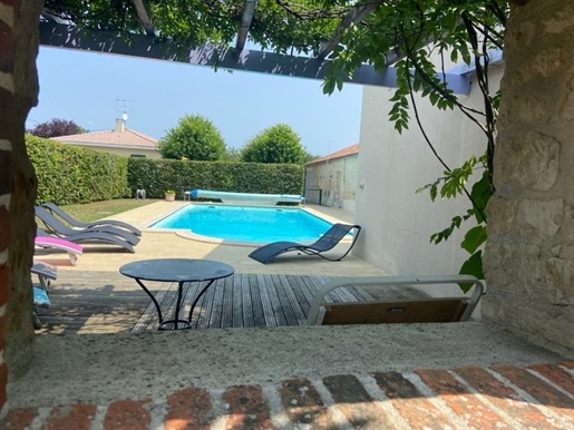 Nalliers heart of village charming house renovated in 2 gites great comfort with swimming pool and 