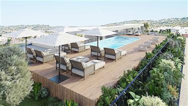 Apartamento T2 novo com piscina no último piso em Loulé, Algarve