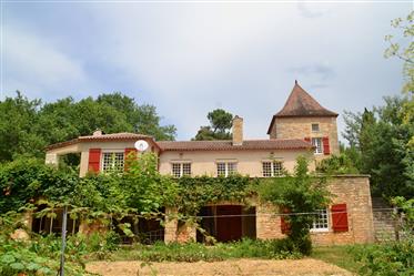 Attractive stone house in very good order with 30 acres (13 hectares) of woodlands and fields