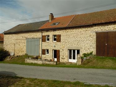 A stone house, very well maintained and immediately habitable, with barns, a