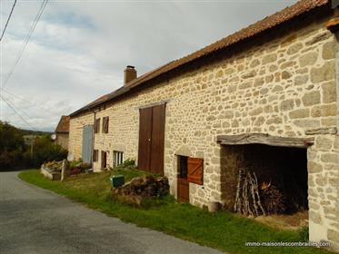 A stone house, very well maintained and immediately habitable, with barns, a